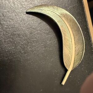 Elegant Gold Feather Brooch
